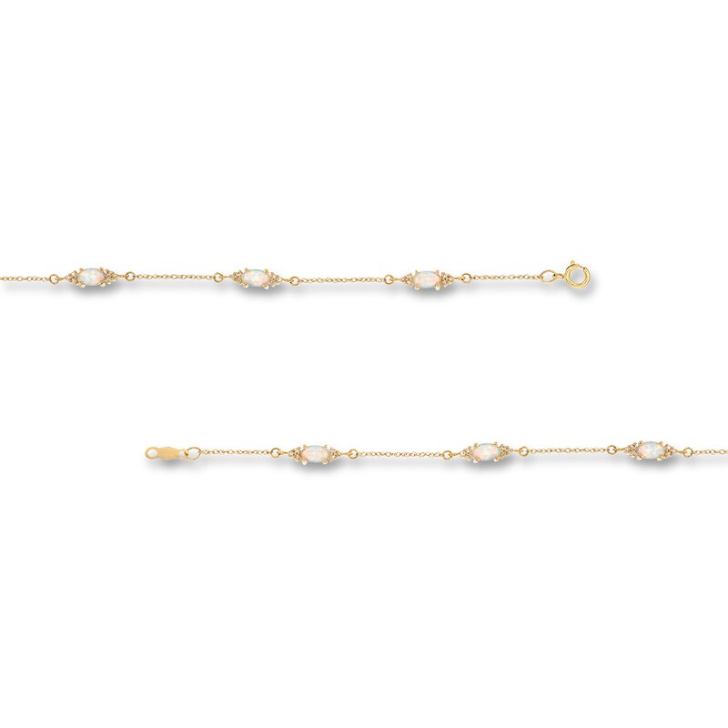 Main Image 3 of Oval Lab-Created Opal and 1/15 CT. T.W. Diamond Three Stone Station Bracelet in 10K Gold - 7.25"