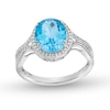Thumbnail Image 1 of Oval Swiss Blue Topaz and Lab-Created Sapphire Halo Ring in Sterling Silver