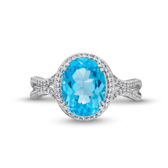 Oval Swiss Blue Topaz and Lab-Created Sapphire Halo Ring in Sterling Silver