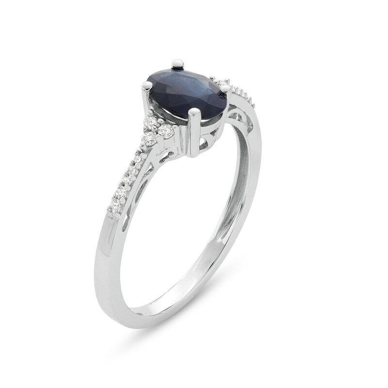 Oval Blue Sapphire and 1/10 CT. T.W. Diamond Ring in 10K White Gold