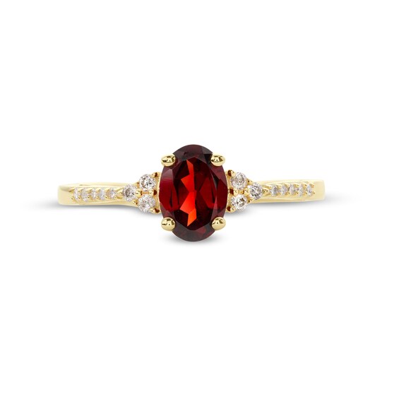 Oval Garnet and 1/10 CT. T.w. Diamond Ring in 10K Gold