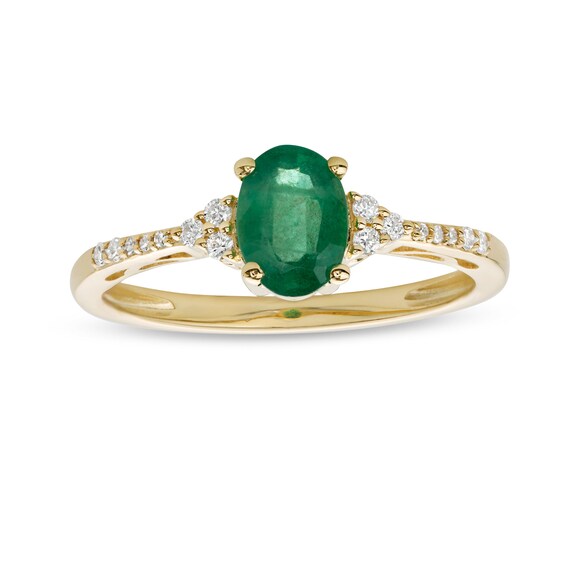 Oval Emerald and 1/10 CT. T.w. Diamond Ring in 10K Gold