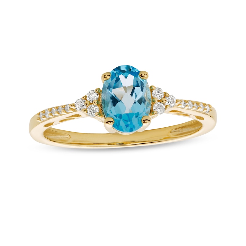 Main Image 1 of Oval Swiss Blue Topaz and 1/10 CT. T.W. Diamond Ring in 10K Gold