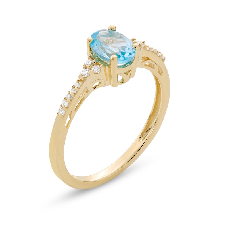 Main Image 3 of Oval Swiss Blue Topaz and 1/10 CT. T.W. Diamond Ring in 10K Gold