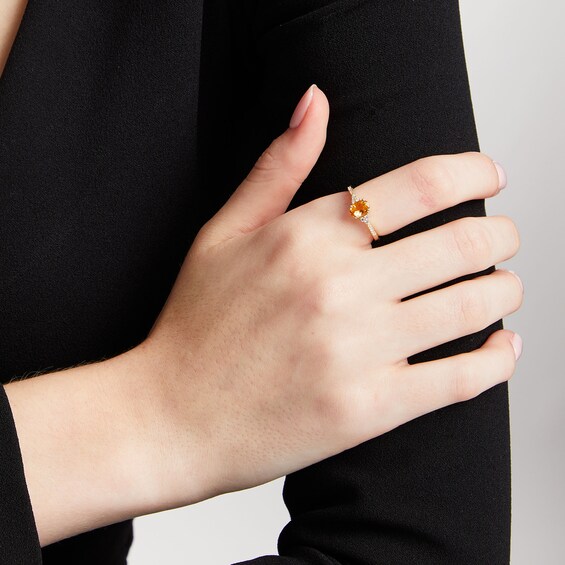 Oval Citrine and 1/10 CT. T.w. Diamond Ring in 10K Gold