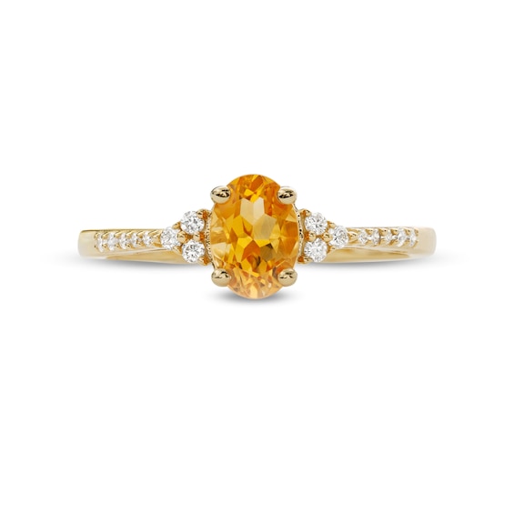 Oval Citrine and 1/10 CT. T.w. Diamond Ring in 10K Gold