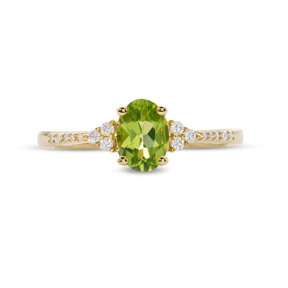 Oval Peridot and 1/10 CT. T.w. Diamond Ring in 10K Gold