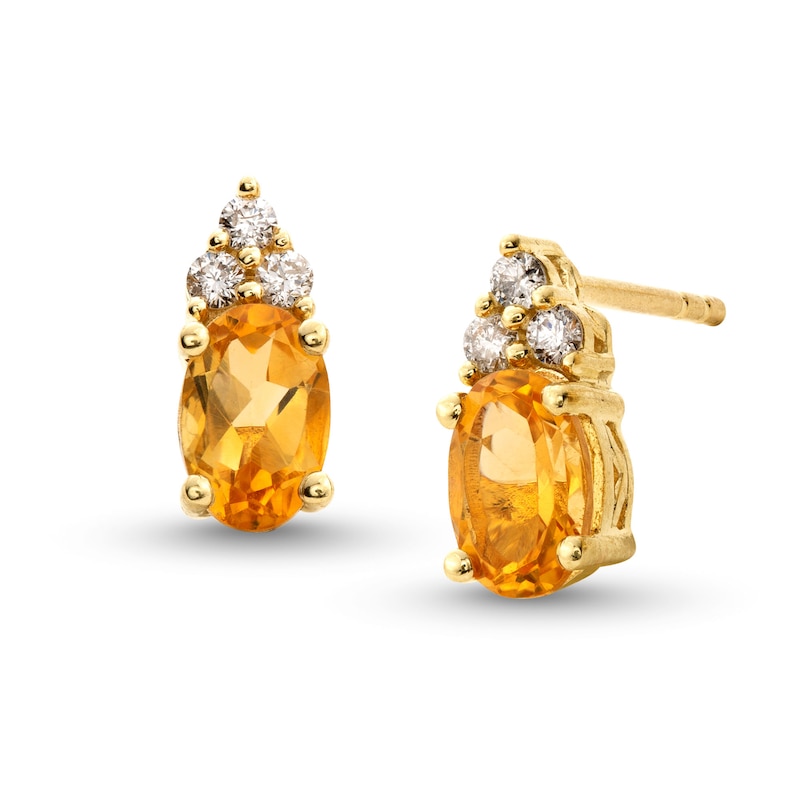 Main Image 1 of Oval Citrine and 1/10 CT. T.W. Diamond Stud Earrings in 10K Gold