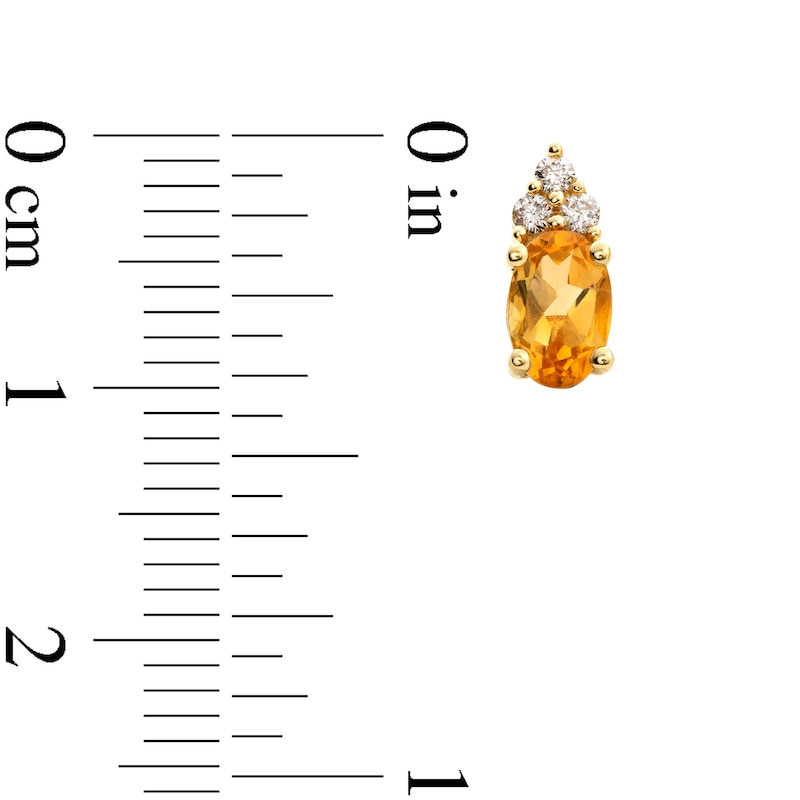 Main Image 3 of Oval Citrine and 1/10 CT. T.W. Diamond Stud Earrings in 10K Gold