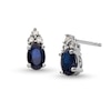 Thumbnail Image 1 of Oval Blue Sapphire and 1/10 CT. T.W. Diamond Stud Earrings in 10K White Gold