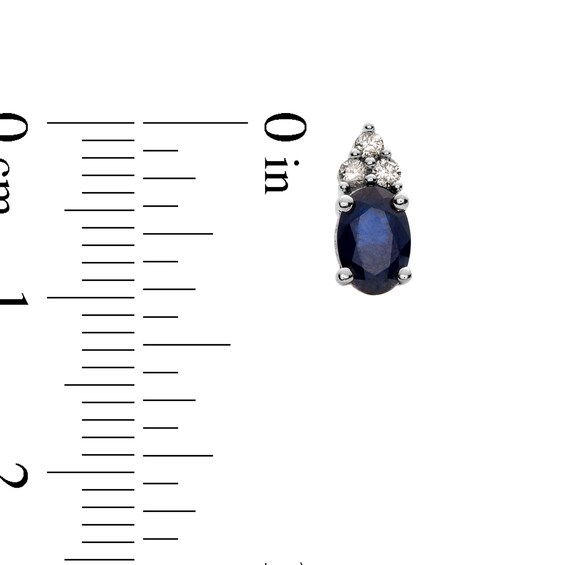 Oval Blue Sapphire and 1/10 CT. T.w. Diamond Stud Earrings in 10K White Gold