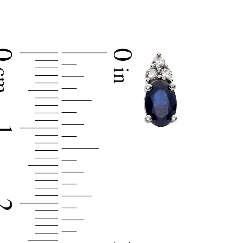 Main Image 3 of Oval Blue Sapphire and 1/10 CT. T.W. Diamond Stud Earrings in 10K White Gold