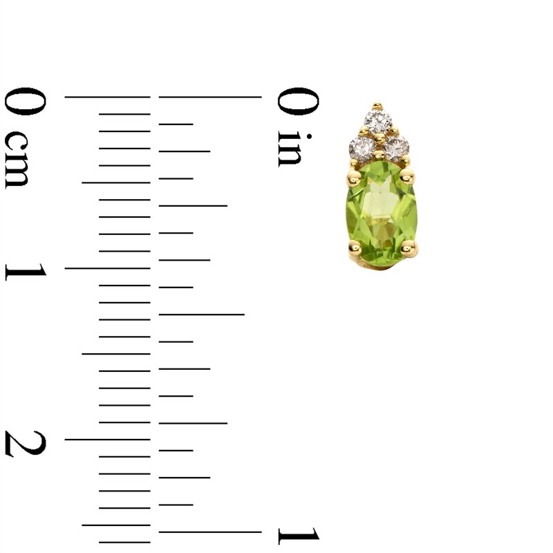 Main Image 3 of Oval Peridot and 1/10 CT. T.W. Diamond Stud Earrings in 10K Gold
