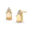 Thumbnail Image 0 of Oval Opal and 1/10 CT. T.W. Diamond Stud Earrings in 10K Gold