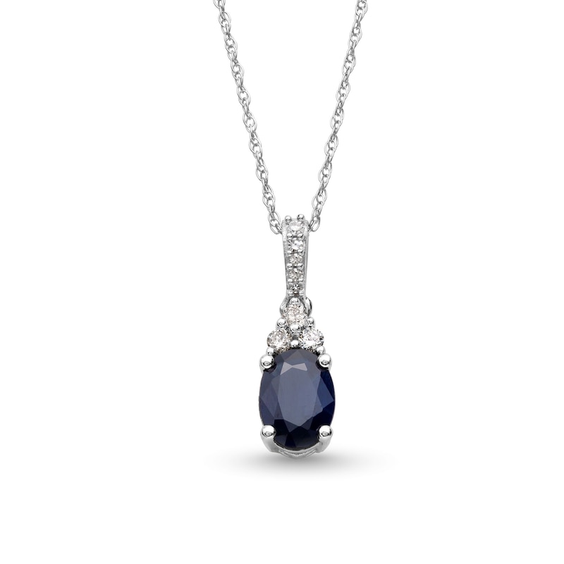 Main Image 1 of Oval Blue Sapphire and 1/15 CT. T.W. Diamond Pendant in 10K White Gold
