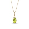 Thumbnail Image 1 of Oval Peridot and 1/15 CT. T.W. Diamond Pendant in 10K Gold