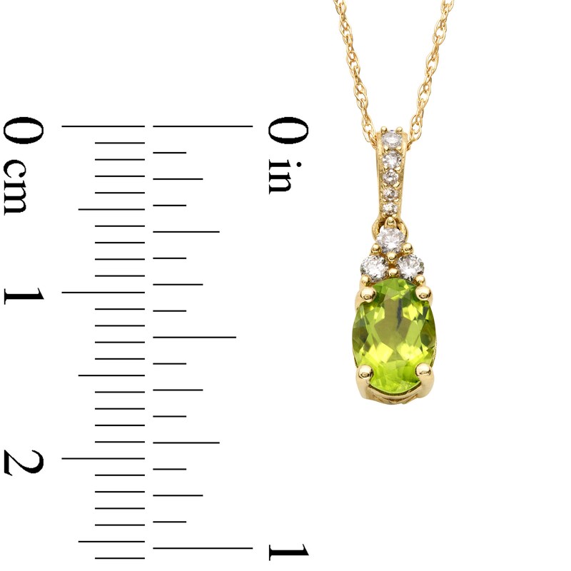 Main Image 3 of Oval Peridot and 1/15 CT. T.W. Diamond Pendant in 10K Gold