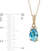 Thumbnail Image 3 of Oval Swiss Blue Topaz and 1/15 CT. T.W. Diamond Pendant in 10K Gold