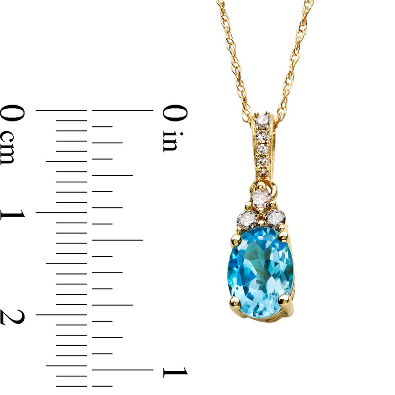 Main Image 3 of Oval Swiss Blue Topaz and 1/15 CT. T.W. Diamond Pendant in 10K Gold