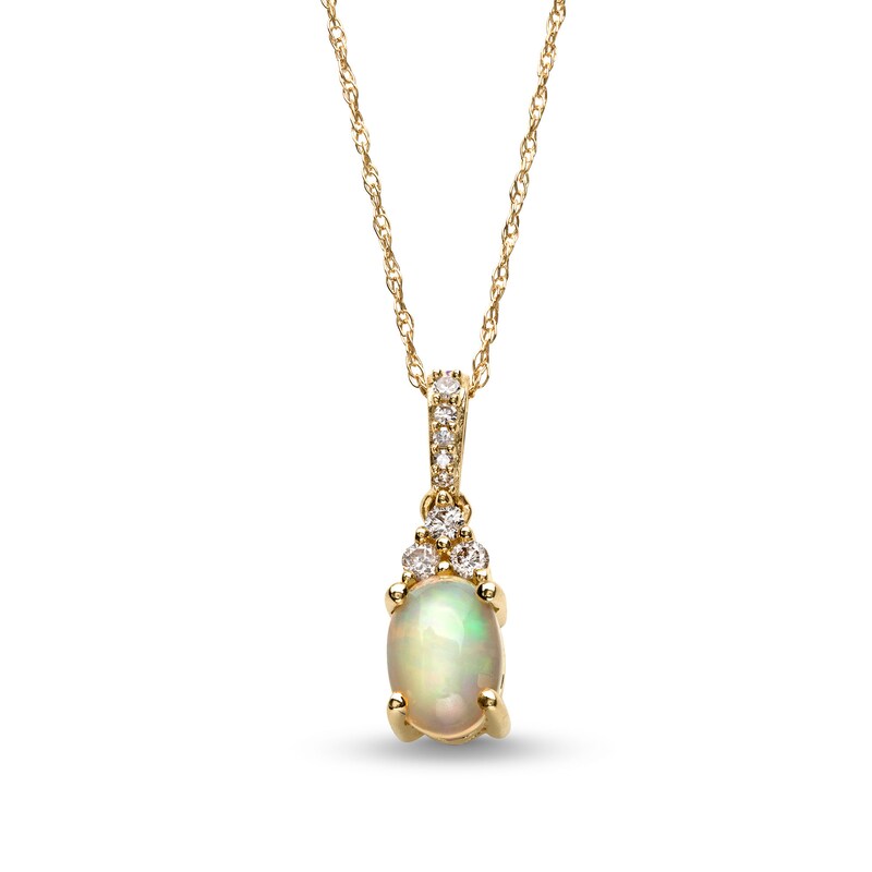 Main Image 1 of Oval Opal and 1/15 CT. T.W. Diamond Pendant in 10K Gold