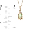 Thumbnail Image 2 of Oval Opal and 1/15 CT. T.W. Diamond Pendant in 10K Gold