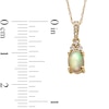 Thumbnail Image 3 of Oval Opal and 1/15 CT. T.W. Diamond Pendant in 10K Gold