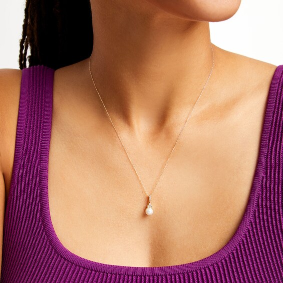 6.0mm Freshwater Cultured Pearl and 1/15 CT. T.w. Diamond Pendant in 10K Gold
