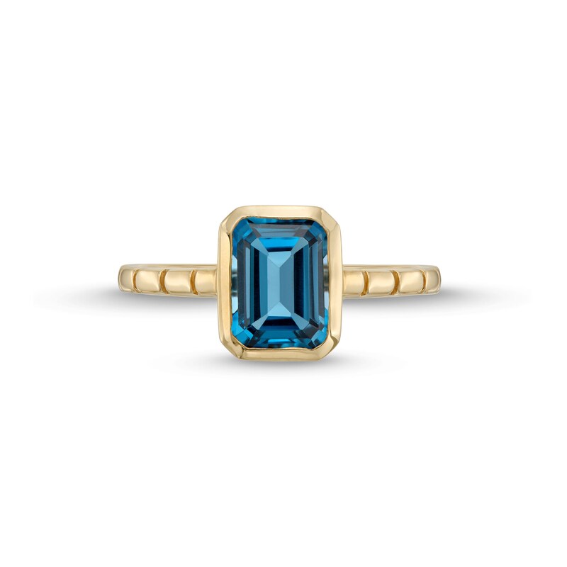 Emerald-Cut London Blue Topaz Solitaire Ribbed Shank Ring in 10K Gold