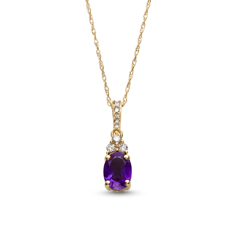 Main Image 1 of Oval Amethyst and 1/15 CT. T.W. Diamond Pendant in 10K Gold