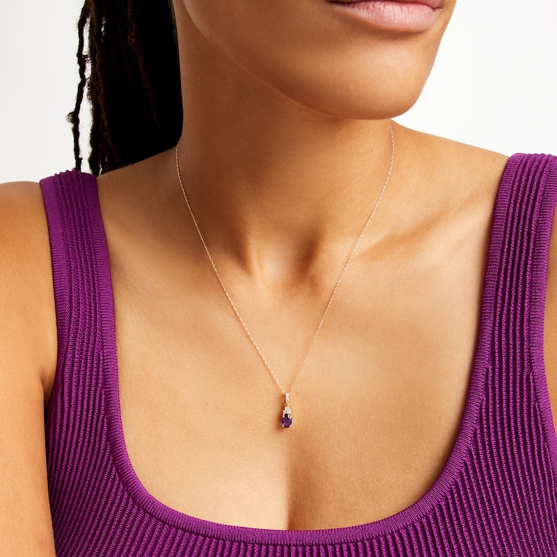 Main Image 2 of Oval Amethyst and 1/15 CT. T.W. Diamond Pendant in 10K Gold