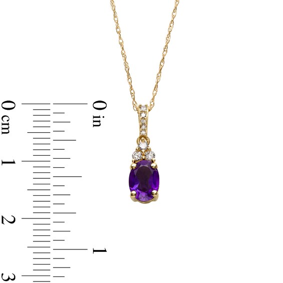Oval Amethyst and 1/15 CT. T.w. Diamond Pendant in 10K Gold