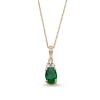 Thumbnail Image 1 of Oval Emerald and 1/15 CT. T.W. Diamond Pendant in 10K Gold