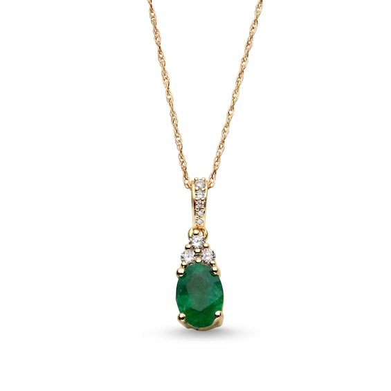 Oval Emerald and 1/15 CT. T.w. Diamond Pendant in 10K Gold
