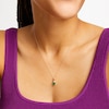 Thumbnail Image 2 of Oval Emerald and 1/15 CT. T.W. Diamond Pendant in 10K Gold