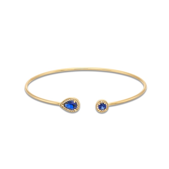 Pear-Shaped and Round Blue Lab-Created Sapphire with 1/8 CT. T.w. Diamond Open Flex Bangle in 10K Gold