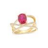 Thumbnail Image 0 of Oval Lab-Created Ruby and White Lab-Created Sapphire Orbit Ring in 10K Gold