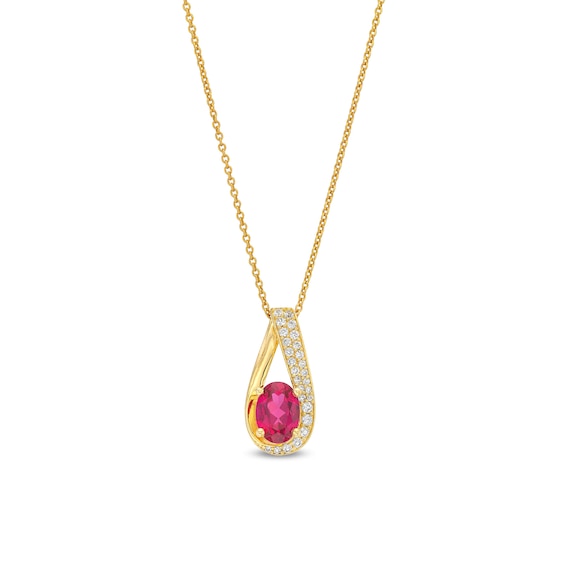 Oval Lab-Created Ruby and 1/6 CT. T.w. Diamond Teardrop Pendant in 10K Gold