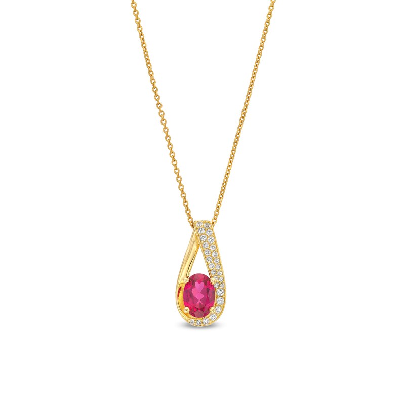 Oval Lab-Created Ruby and 1/6 CT. T.W. Diamond Teardrop Pendant in 10K Gold