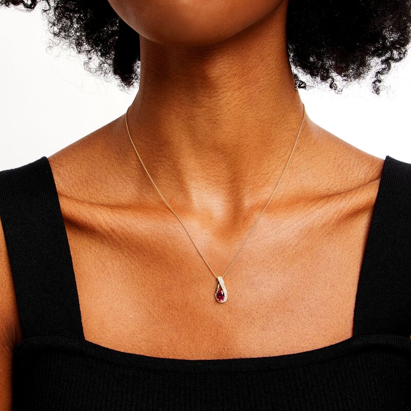 Main Image 2 of Oval Lab-Created Ruby and 1/6 CT. T.W. Diamond Teardrop Pendant in 10K Gold