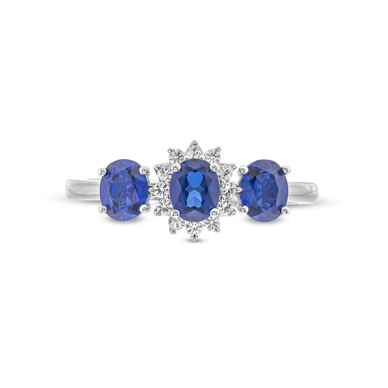 Main Image 4 of Oval Blue Lab-Created Sapphire and 1/8 CT. T.W. Diamond Starburst Frame Three Stone Ring in 10K White Gold