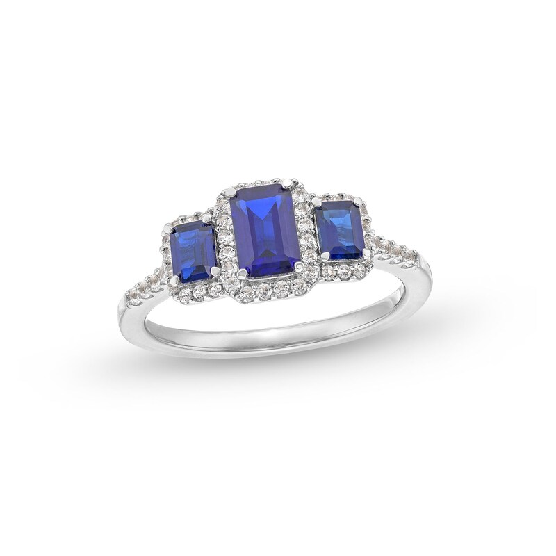 Emerald-Cut Blue Lab-Created Sapphire and 1/4 CT. T.W. Diamond Frame Three Stone Ring in 10K White Gold