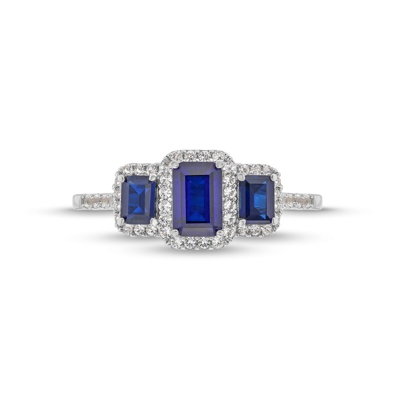 Emerald-Cut Blue Lab-Created Sapphire and 1/4 CT. T.W. Diamond Frame Three Stone Ring in 10K White Gold