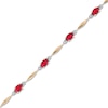 Thumbnail Image 0 of Oval Lab-Created Ruby, Diamond Accent and Rice Bead Alternating Bracelet in 10K Gold - 7.25"