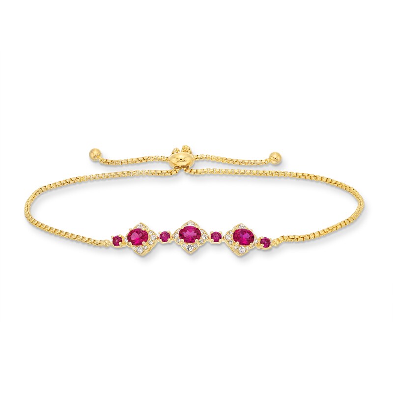 Main Image 1 of Oval Certified Ruby and 1/5 CT. T.W. Diamond Flower Frame Three Stone Bolo Bracelet in 10K Gold - 9&quot;