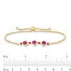 Thumbnail Image 2 of Oval Certified Ruby and 1/5 CT. T.W. Diamond Flower Frame Three Stone Bolo Bracelet in 10K Gold - 9"