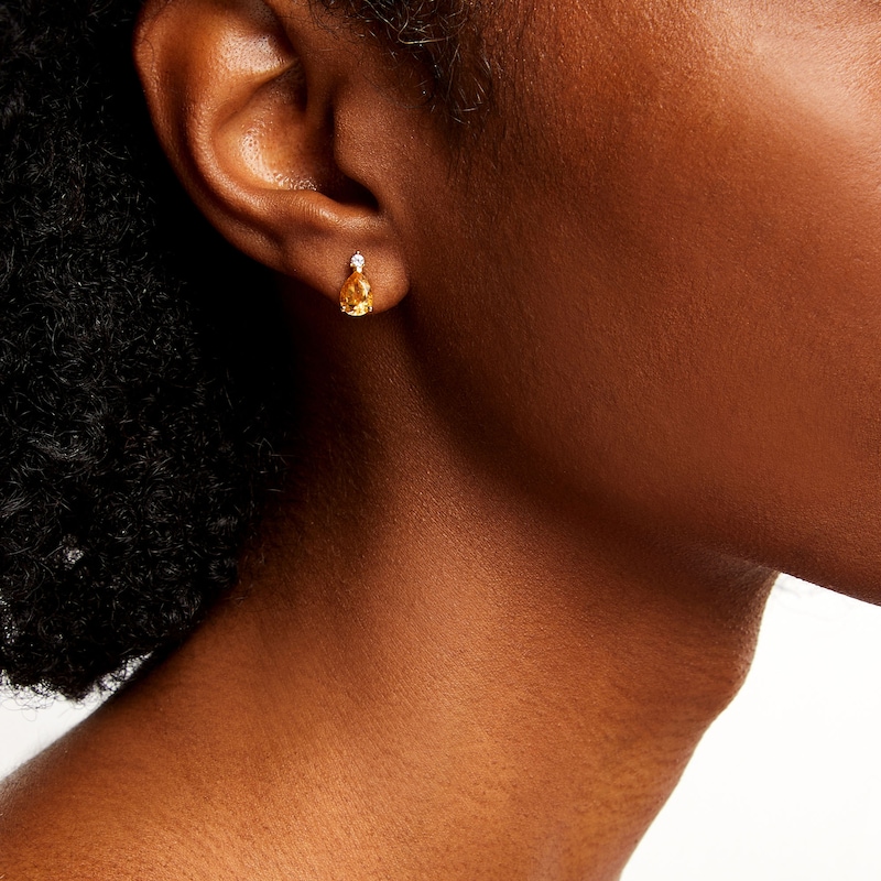 Main Image 2 of Pear-Shaped Citrine and 1/20 CT. T.W. Diamond Stud Earrings 10K Gold