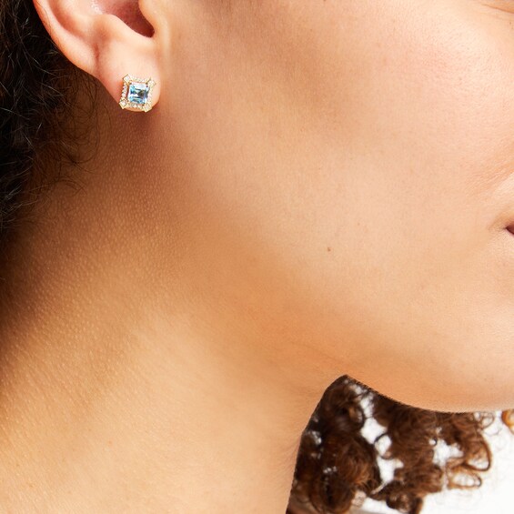 Asscher-Cut London Blue Topaz and 1/10 CT. T.w. Diamond Concave Frame Stud Earrings in 10K Gold