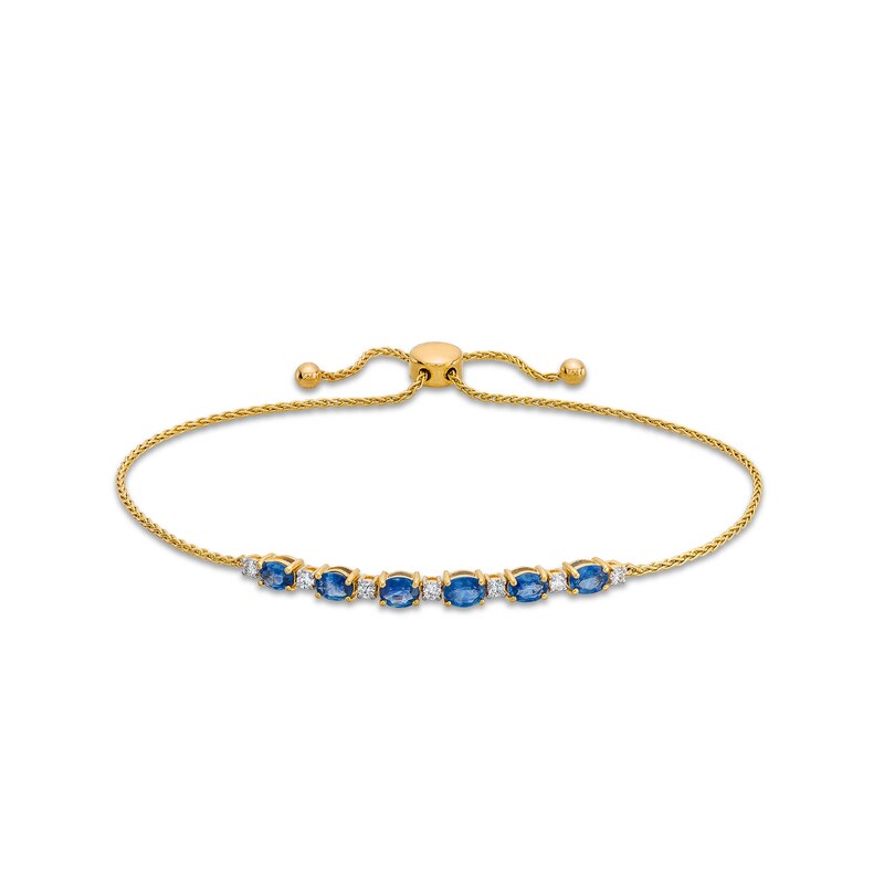 Main Image 1 of Oval Blue Sapphire and 1/8 CT. T.W. Diamond Alternating Bolo Bracelet in 10K Gold - 9"