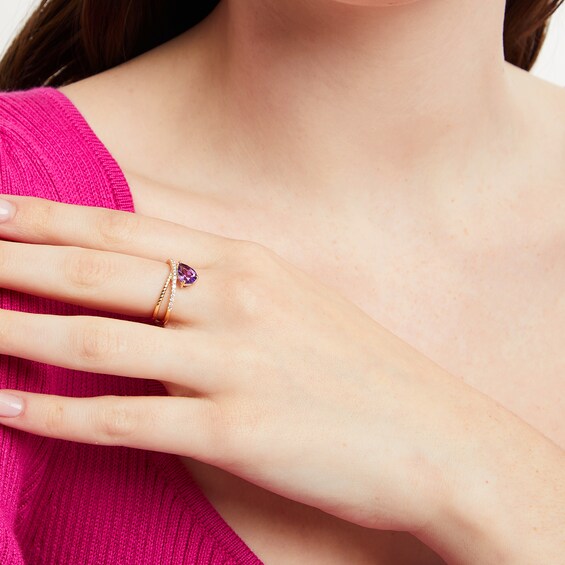Pear-Shaped Amethyst and 1/5 CT. T.w. Diamond Orbit Ring in 10K Gold