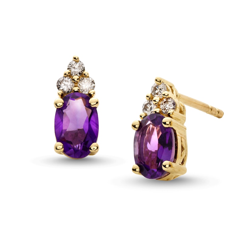 Main Image 1 of Oval Amethyst and 1/10 CT. T.W. Diamond Tri-Top Stud Earrings in 10K Gold